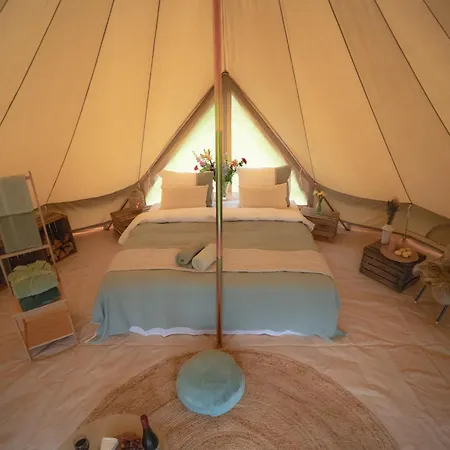 Luxury tent Boutique Tent 'pruum' Op Unieke Plek In Het Met Luxe Bed